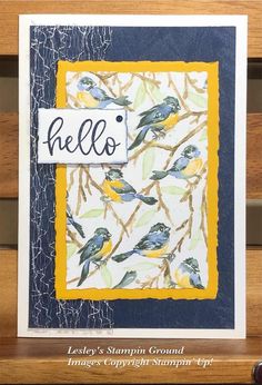 a close up of a card with birds on it