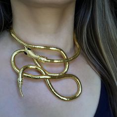 Moldable ,light weight and uniques snake  can be used as a necklace or bracelet. Necklace is made of Alloy Necklace size:36 1/2 inches long Metal Snake Shape Necklace, Elegant Gold-tone Snake Shaped Jewelry, Elegant 14k Gold Snake-shaped Necklaces, Handmade Gold Snake-shaped Necklace, Serpent Necklace, Gold Snake-shaped Metal Necklace, Serpent Jewelry, Necklace Snake, Wiccan Jewelry