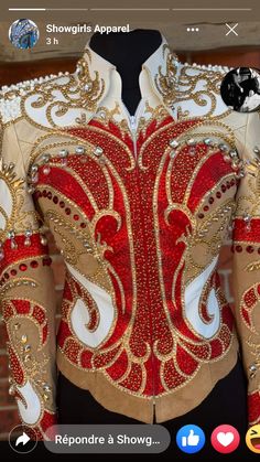 the back of a red and white jacket with gold sequins on it's shoulders