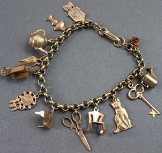 Vintage Charm Bracelets and Charms | Antique Charm Bracelet / 13 Charms. Victorian Charm Bracelet, Vintage Charm Bracelet Gold, Vintage Charm Bracelets, Vintage Charm Bracelet Silver, Handmade Charm Bracelet, Antique Gold Charm Bracelet, Aesthetic Charm Bracelet, Vintage Charm Necklace