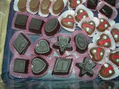 a tray filled with lots of different types of chocolates