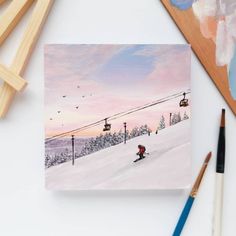 a painting of a person skiing down a hill at sunset with ski lift in the background