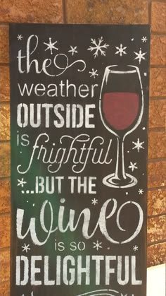 the weather outside is beautiful but the wine is so delightful quote on black background with white snowflakes