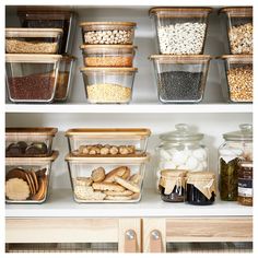 the shelves are filled with different types of food and storage containers, including cereals