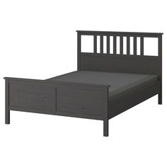 the bed frame is made up with two drawers on one side and an open drawer at the end