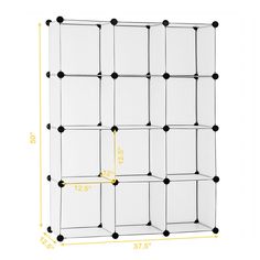 a white and black wall mounted display unit with eight cubes on each side, measurements for