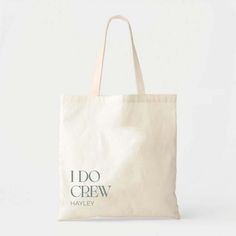 a tote bag that says i do crew in blue on the front and bottom