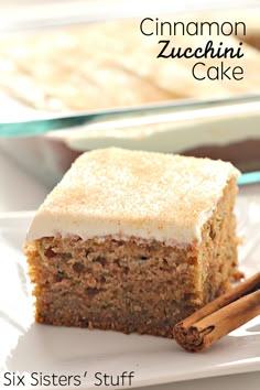 a piece of zucchini cake sitting on top of a plate next to a fork