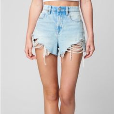 The Barrow Denim Short With Rips Ripped Light Wash Cotton Bottoms, Ripped Cotton Bottoms Of Short Length, Light Wash Cutoff Shorts For Spring, Blue Relaxed Fit Distressed Shorts, Ripped Denim Shorts For Day Out, Light Wash Distressed High-waisted Shorts, Distressed Short Leg Bottoms For Spring, Medium Wash Cutoff Shorts For Day Out, Cutoff Denim Shorts For Day Out