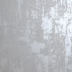 a white and gray wall that has been painted with some paint chipping on it