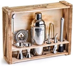 a wooden box filled with different types of kitchen utensils and drinks in it