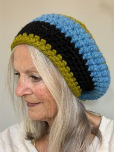 Crochet hat / Slouchy Winter Hat / Handmade and Unique Hat / Comfortable Hat Handmade Yarn Beanie Mini Hats, Handmade Funky Hats One Size Fits Most, Unique Handmade Hat One Size, Artisan Handmade Hats One Size, Unique Handmade One-size Hats, Artisan Handmade Hat, Funky Handmade Beanie Hat, Handmade Multicolor Slouchy Hat, Multicolor Handmade Slouchy Hats