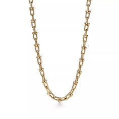 Inspired by the Tiffany & Co. design, this necklace is a gorgeous chain of u-shaped links in 14-karat yellow gold. Simple enough to be worn during the day but can be dressed up in the evening as well, making it a beautiful multi-faceted piece. 14KT Yellow Gold 18 inches in length Tiffany Hardwear Necklace, Tiffany Hardwear, خواتم خطوبة, قلادات متدلية, Gold Tiffany, Diamond Drop Necklace, Tiffany Necklace, Necklace Rose Gold, International Jewelry