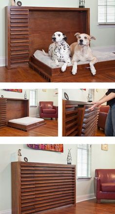 two dogs sitting on top of a wooden bed