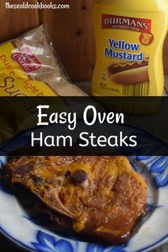 easy oven ham steaks with mustard and mustard sauce on the side, next to a bottle of mustard