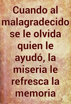 the words in spanish are written on an old, worn and stained paper with black ink