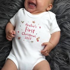 Our adorable Personalised First Christmas 0-3 Months Baby Vest is made from 100% cotton and is a great gift to celebrate baby's first Christmas!The vest can be personalised with a name up to 12 characters and a year of up to 4 characters long.Personalisation will appear as entered.'First Christmas' is fixed text and cannot be changedUnisex Design.The vest is 100% cotton, machine washable and is sized 0-3 months.Cool wash only. Iron on reverse only.This baby vest has a popper fastening for comfort and ease.Ideal for Christmas, Baby's First Christmas Make Your Own Calendar, First Christmas Baby, 4 Characters, 3 Month Baby, Baby Christmas Gifts, Baby's First Christmas, Personalized Christmas Gifts