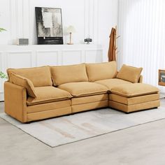 a living room with a sectional couch and rug