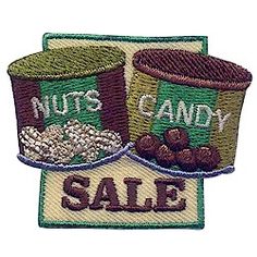 two bags of nuts and candy are on sale