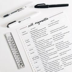 a white table topped with lots of writing