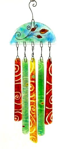 a wind chime with four different colored beads hanging from it