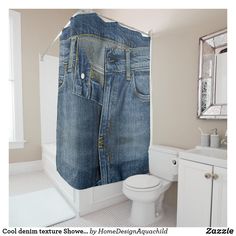 a bathroom with a blue jean shower curtain