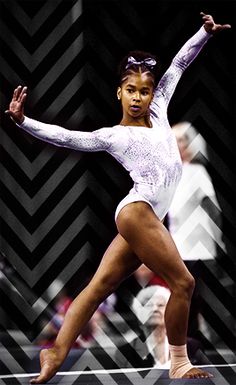 a woman in white leotard standing on one leg