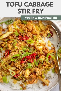 a white plate topped with stir fry and vegetables next to a fork on top of rice