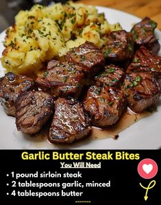 a plate with steak, potatoes and garlic butter steak bites on it's side