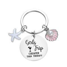 a keychain with a starfish on it that says girls trip, cheaper than therapy