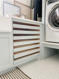 a washer and dryer in a small room