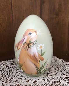 an egg with a rabbit painted on it