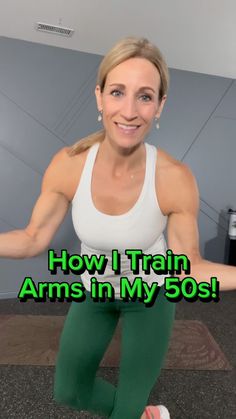 a woman in green leggings and white tank top with the words how i train arms in my 80s