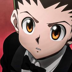 an anime character with brown eyes wearing a tuxedo