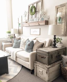 a living room filled with lots of furniture and decor on top of it's walls