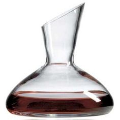 a glass vase with an arrow on the bottom is shown in front of a white background