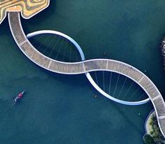 an aerial view of a bridge over water