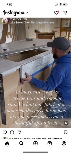 a man fixing a sink in a kitchen with an instagramtion message above it