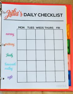 a printable daily planner is shown on a clipboard with markers and pens in front of it