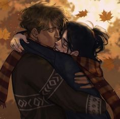 two people hugging each other with autumn leaves in the back ground and behind them are falling leaves