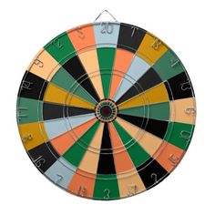 a colorful dart board with numbers on the front and sides, including two arrows pointing in different directions