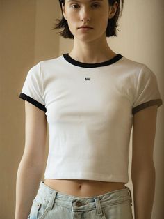 This is a trendy and unique t-shirt by MORCEAU PAR MORCEAU that is made out of high quality and sturdy material. With distinctive mood of the design and feminine look, you can style it for your trendy and casual daily outfit.- Soft and elastic touch of cotton blend fabric- Minimal logo print detail- Cropped and slim silhouette Fitted White Graphic Tee, White Sporty Cropped T-shirt For Spring, Minimalist Crew Neck T-shirt, Trendy Fitted White T-shirt, White Relaxed Fit Minimalist Top, White Cropped T-shirt With Crew Neck, Modern White T-shirt For Everyday, Modern White Everyday T-shirt, White Cropped T-shirt With Letter Print, Crew Neck