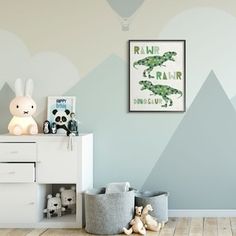 a child's room with mountains painted on the wall