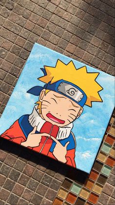 a painting of a cartoon character on a brick wall