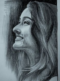 a drawing of a woman's face with long hair and eyes closed, smiling