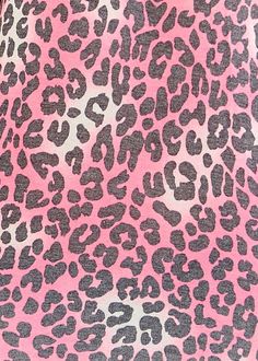 a pink and black animal print fabric with spots on it's back half is shown