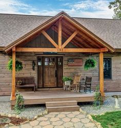 a wooden porch with chairs and an american flag on it