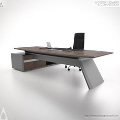 an office desk with a laptop on it