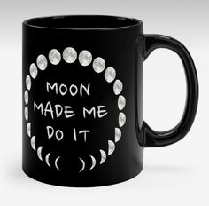 a black coffee mug with the words moon made me do it