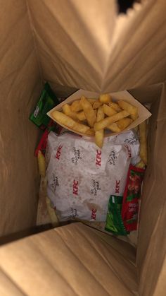 a box filled with french fries sitting on top of a table